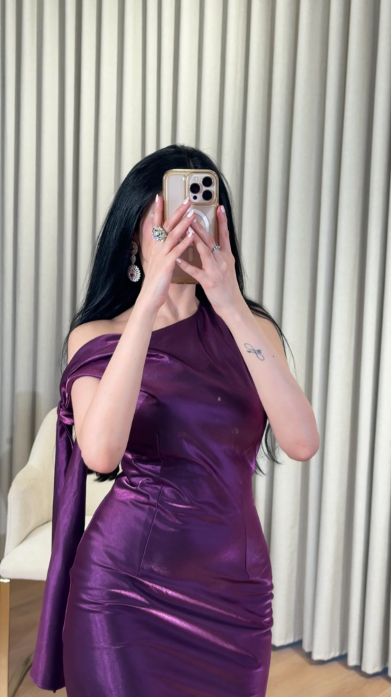 An attractive purple evening dress