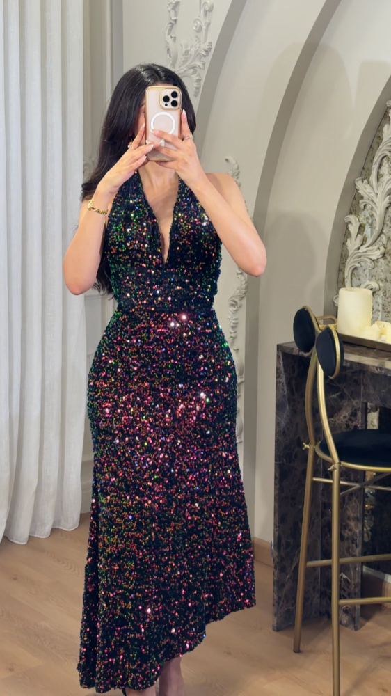Evening dress studded with colorful sequins - halter design with a charming shine