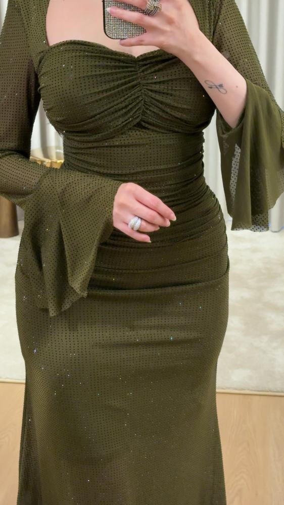 Olive green evening dress embellished with crystals