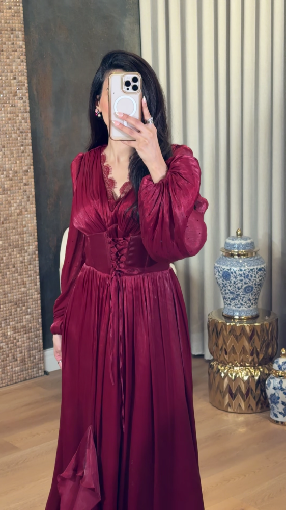 Luxurious burgundy red dress with a corset cut