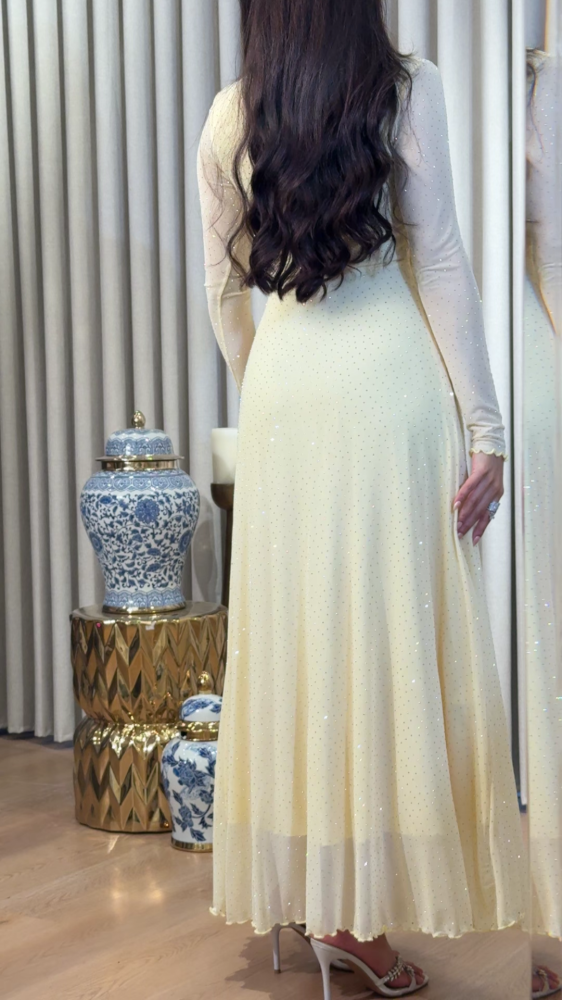 Soft yellow tulle dress with scattered crystals