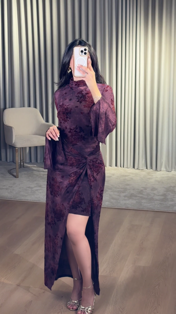 Dark purple dress with a luxurious floral pattern
