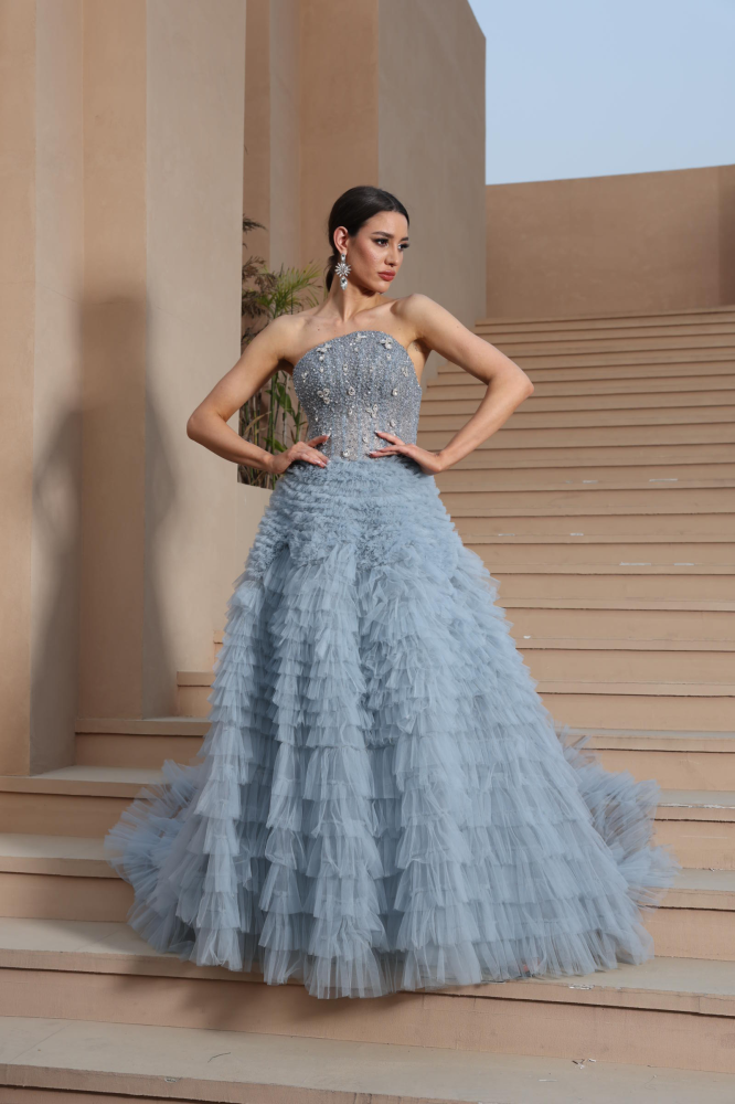 A luxurious evening dress in a calm sky color