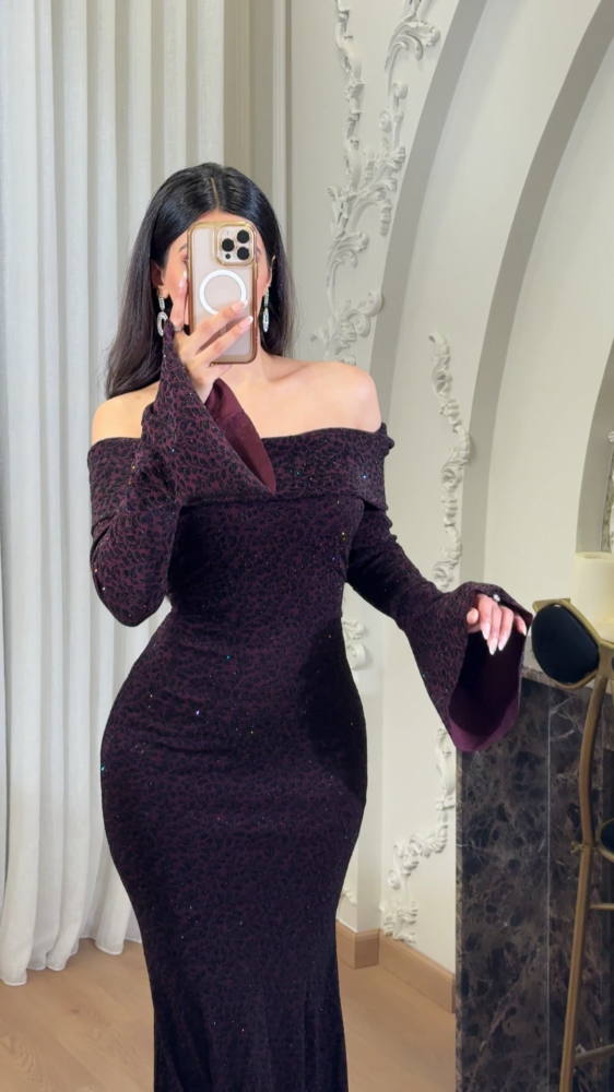 Luxurious feminine dress with intricate patterns in black