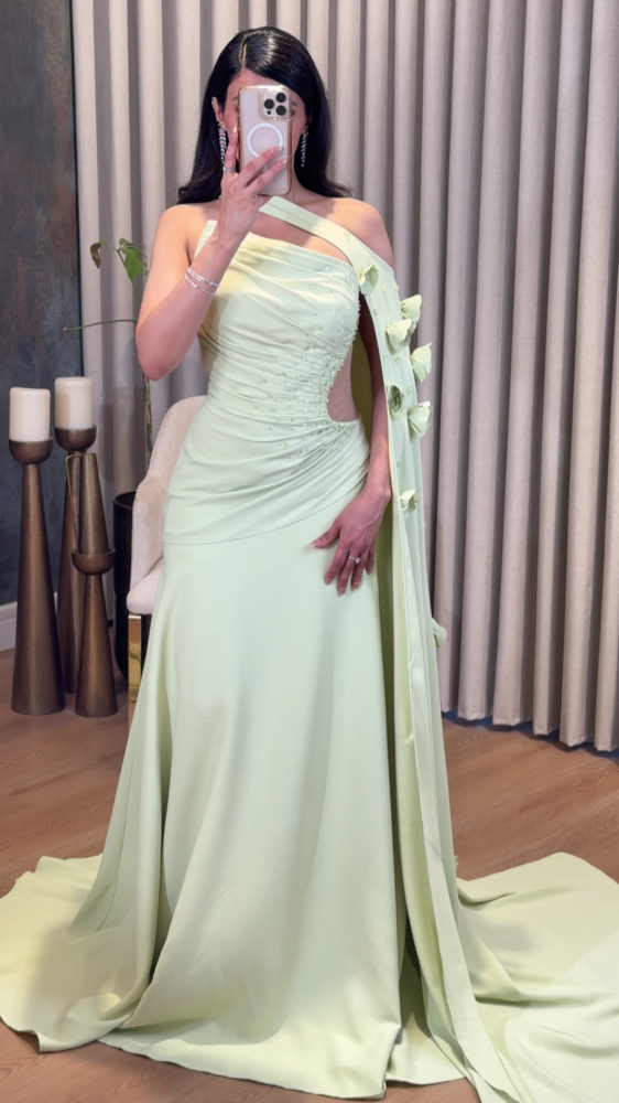 Apple evening dress with a shoulder flap