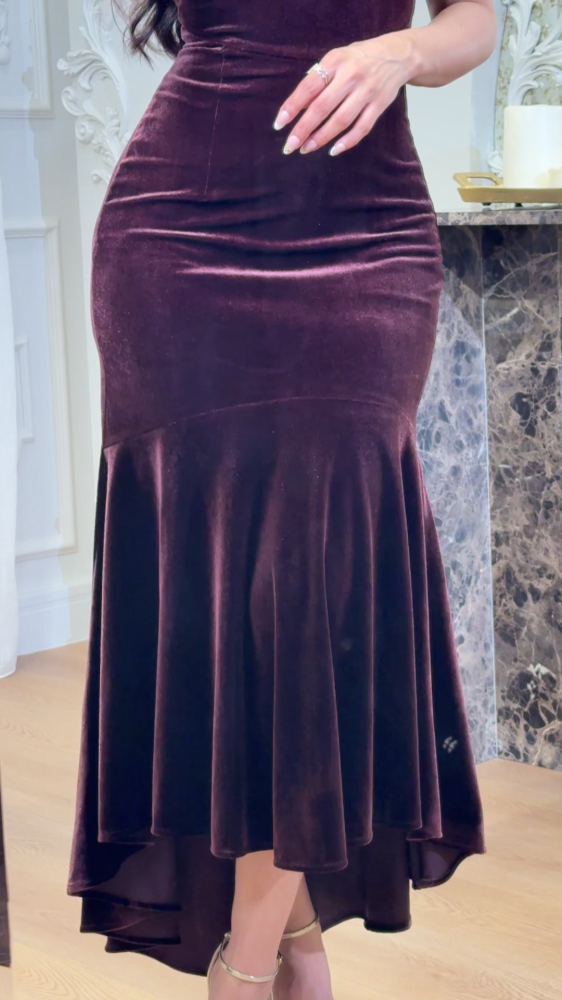 Luxurious mocha velvet dress decorated with gold accessories