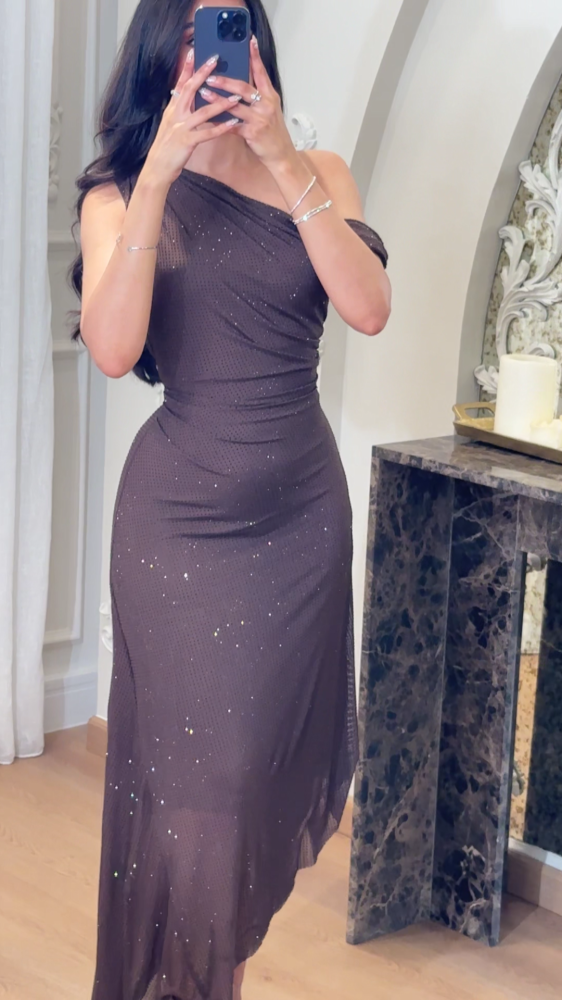 A luxurious mocha evening dress with a sophisticated feminine design