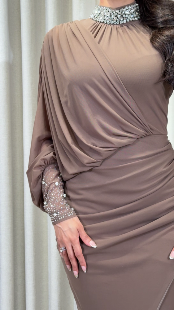 Luxurious brown evening dress studded with crystals