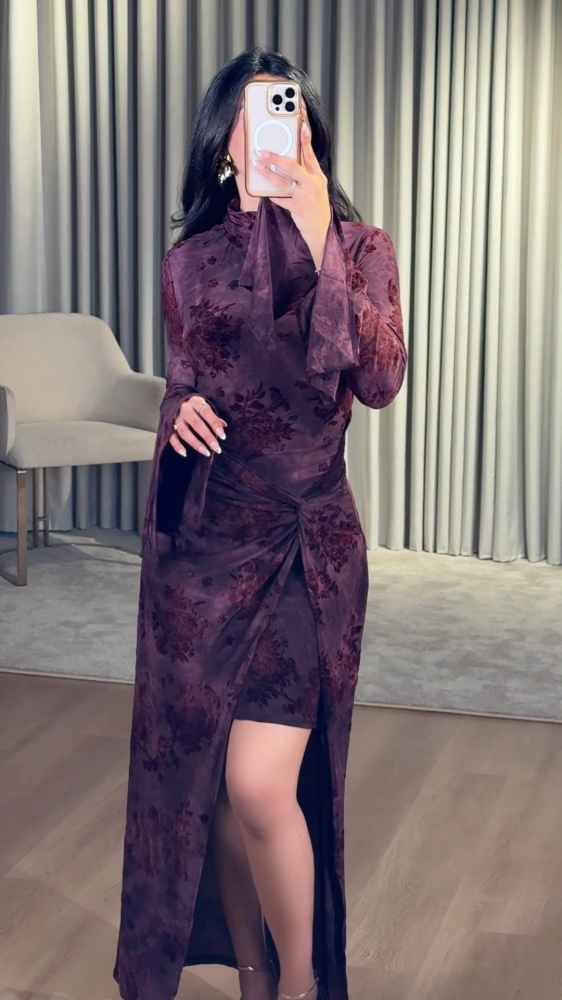 Dark purple dress with a luxurious floral pattern