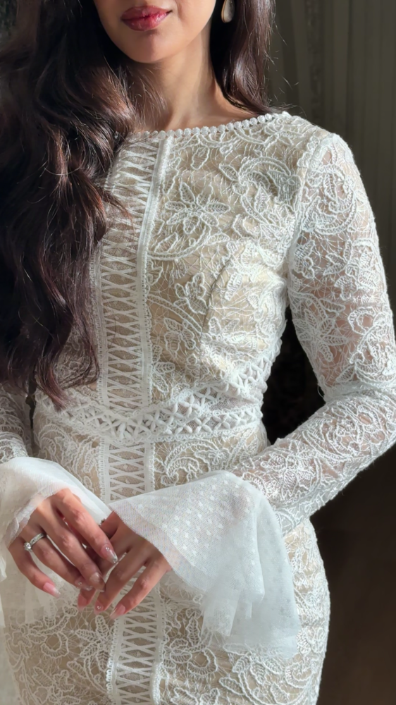 Luxurious white lace dress with elegant design