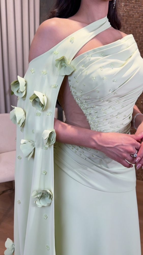 Apple evening dress with a shoulder flap