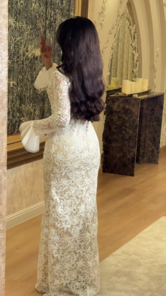 Luxurious white lace dress with elegant design