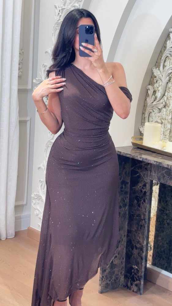 A luxurious mocha evening dress with a sophisticated feminine design
