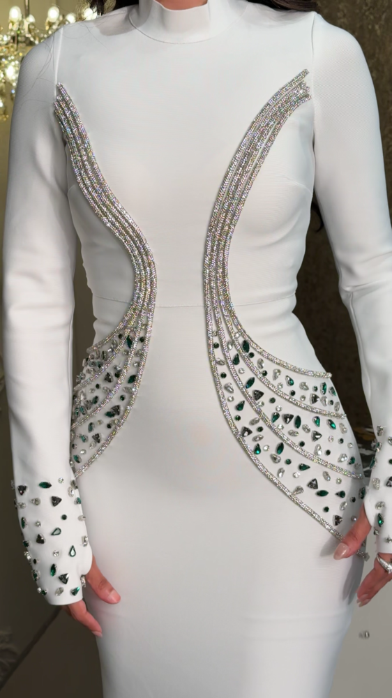 Royal white evening dress studded with crystals