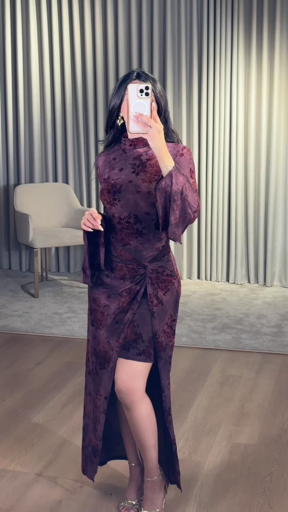 Dark purple dress with a luxurious floral pattern