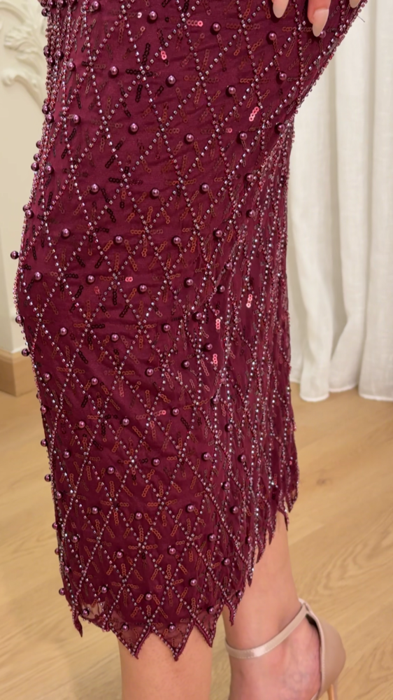 Top evening dress decorated with shawl and pearls