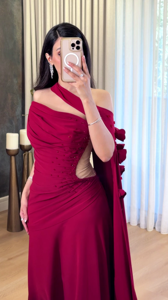 Red evening dress with a shoulder strap
