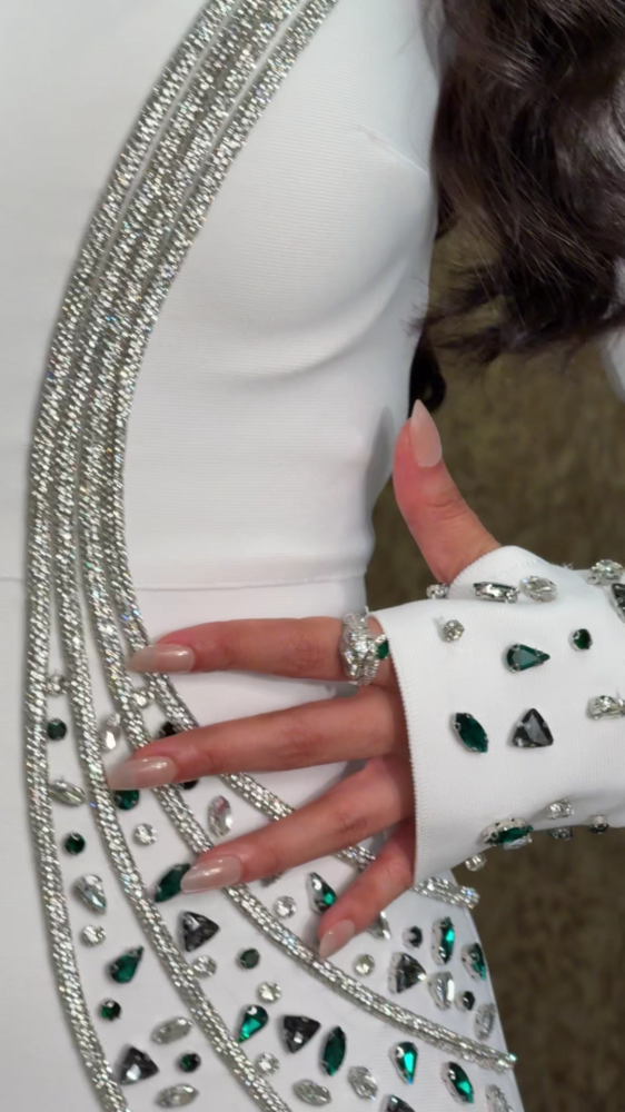 Royal white evening dress studded with crystals