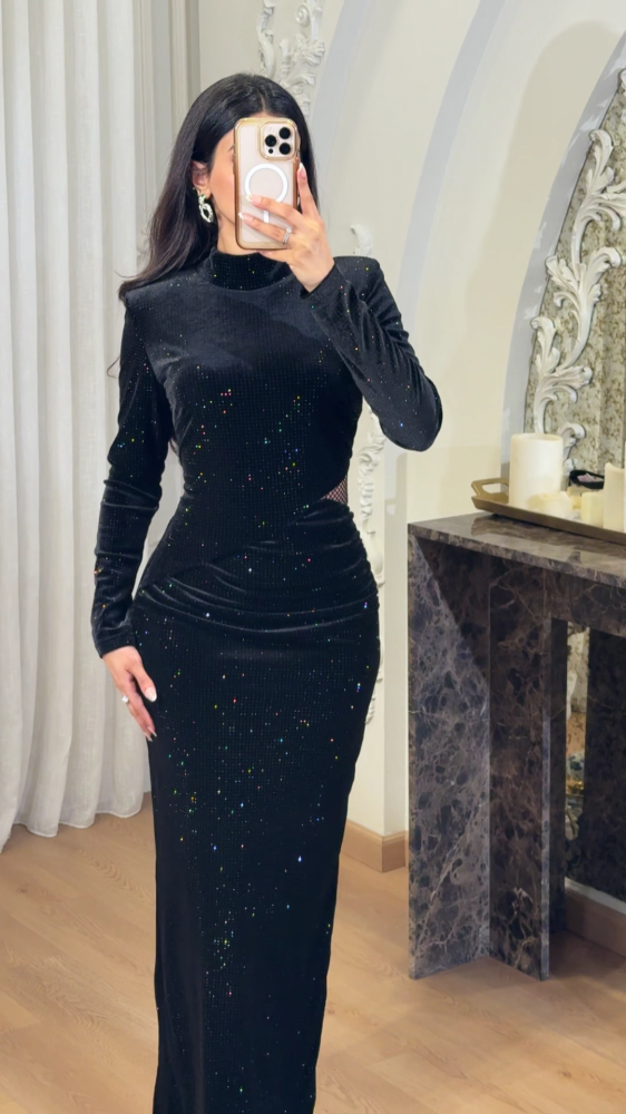 Black velvet evening dress decorated with small crystals
