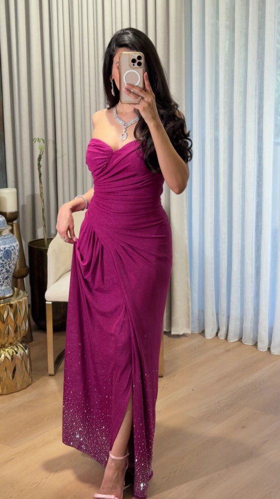 Pink top evening dress decorated with pleats