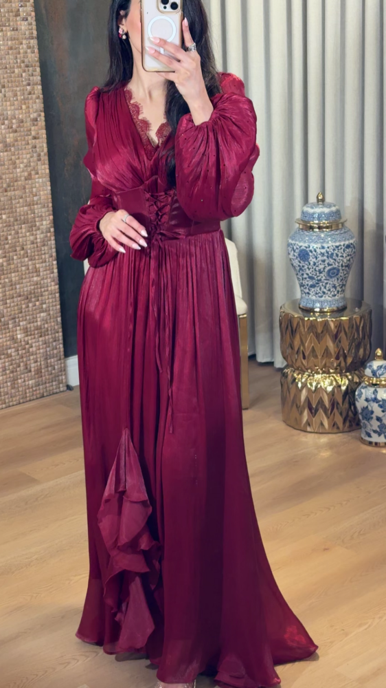 Luxurious burgundy red dress with a corset cut