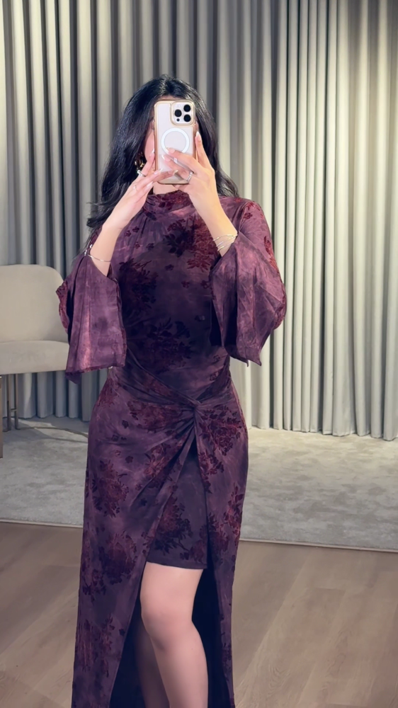 Dark purple dress with a luxurious floral pattern