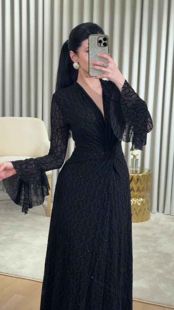 Black dress with luxurious geometric patterns