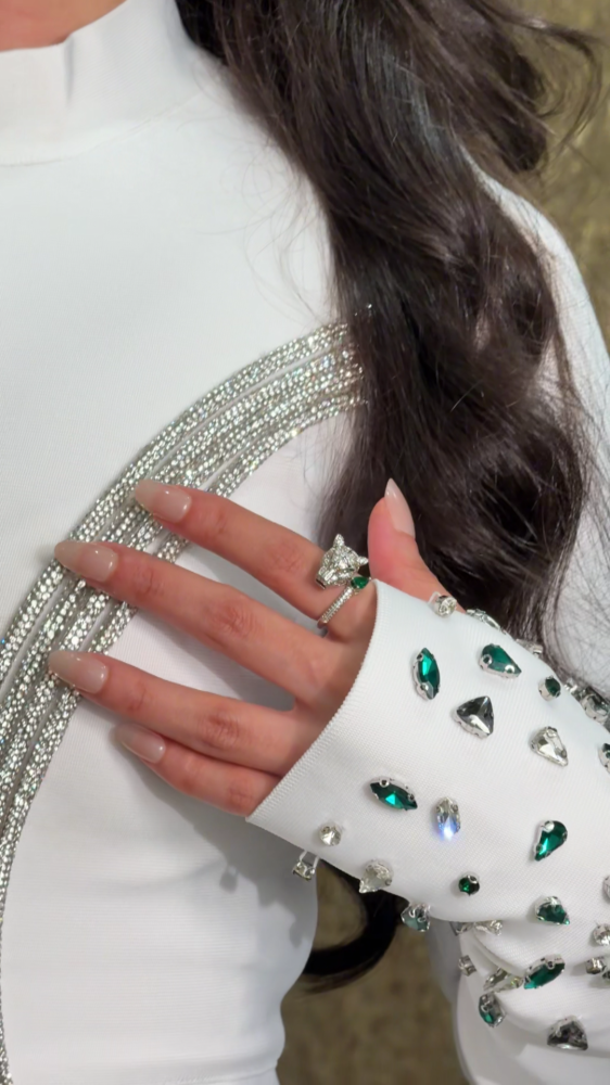 Royal white evening dress studded with crystals