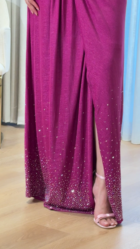 Pink top evening dress decorated with pleats