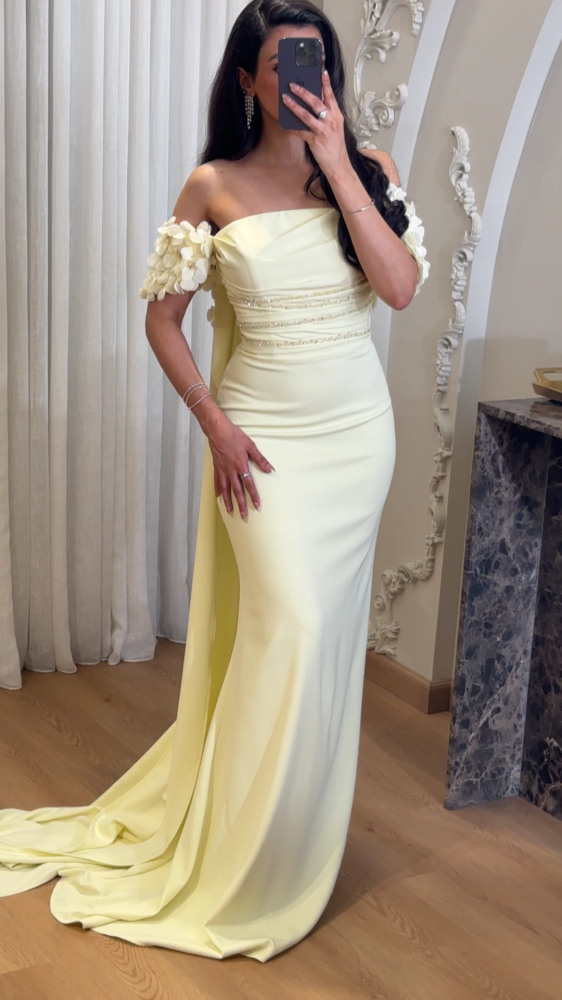 Lemon evening dress with ruffled flowers
