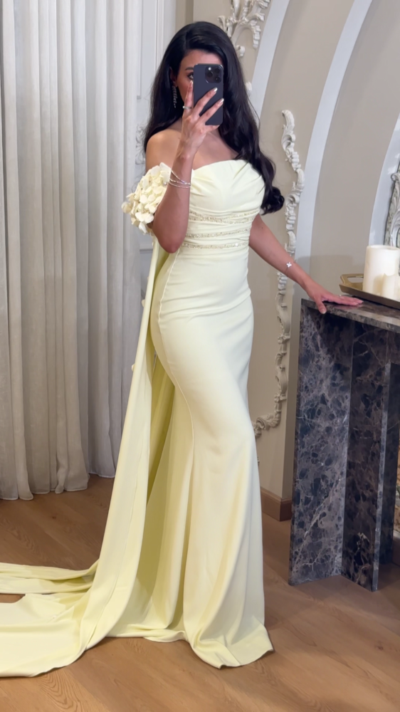 Lemon evening dress with ruffled flowers