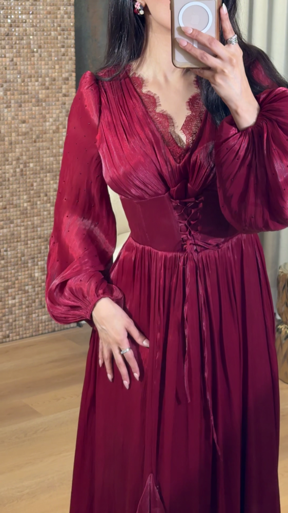 Luxurious burgundy red dress with a corset cut