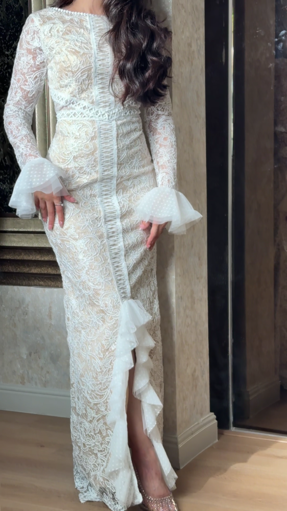 Luxurious white lace dress with elegant design