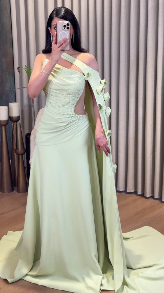 Apple evening dress with a shoulder flap