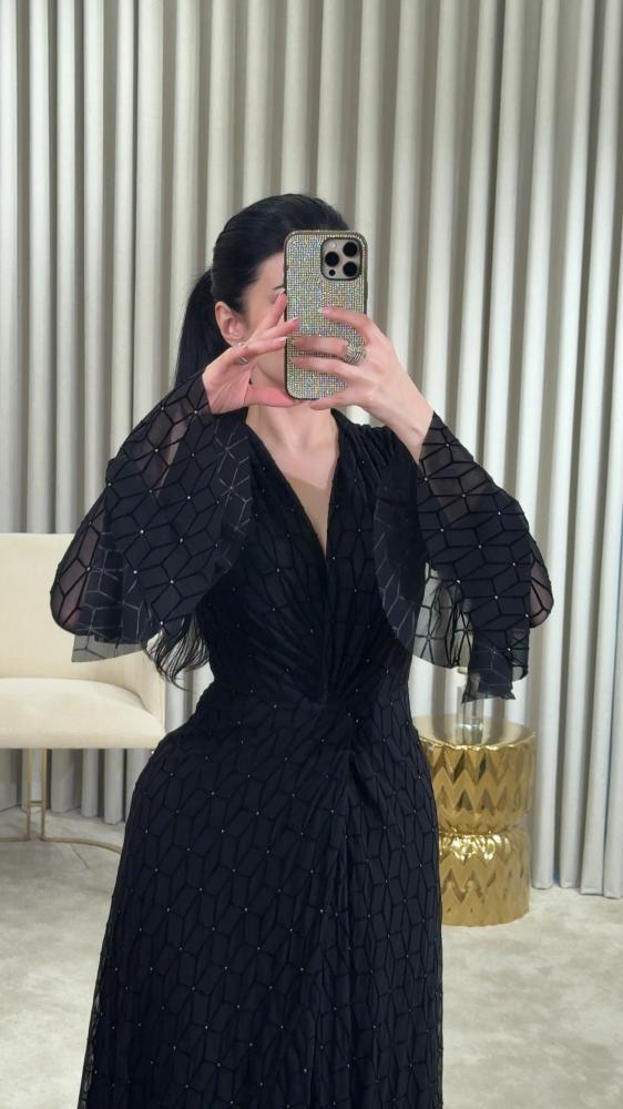 Black dress with luxurious geometric patterns