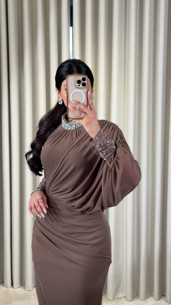 Luxurious brown evening dress studded with crystals