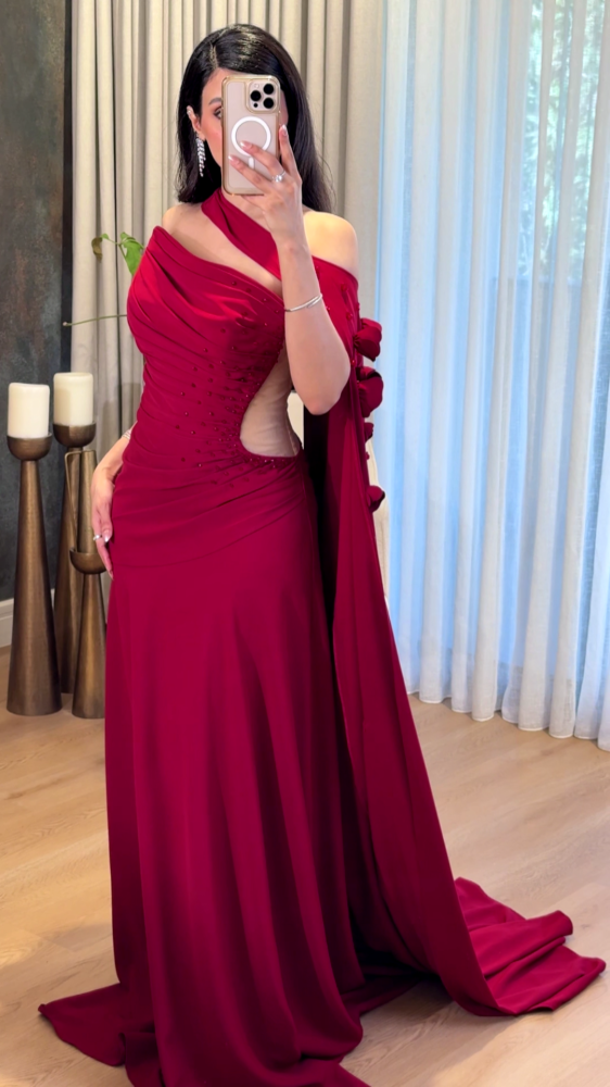 Red evening dress with a shoulder strap