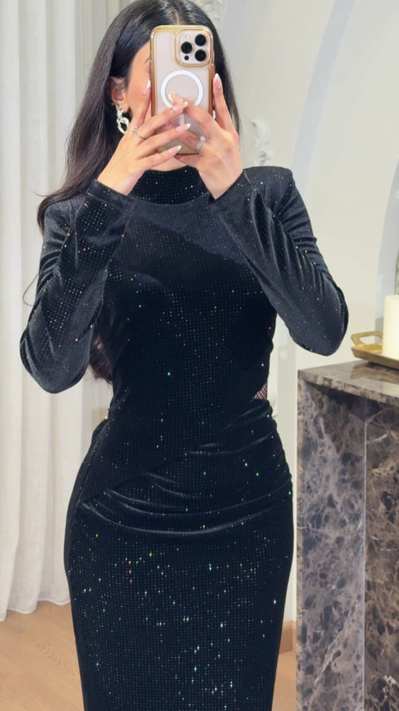 Black velvet evening dress decorated with small crystals