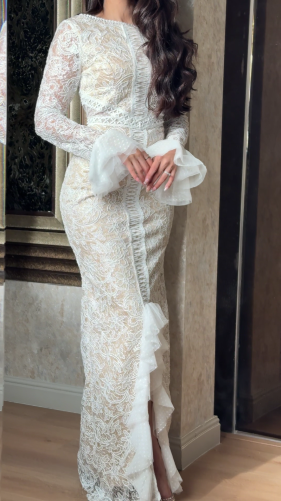 Luxurious white lace dress with elegant design
