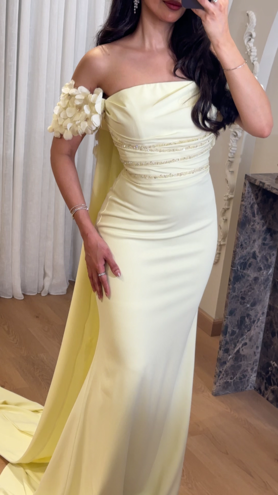 Lemon evening dress with ruffled flowers