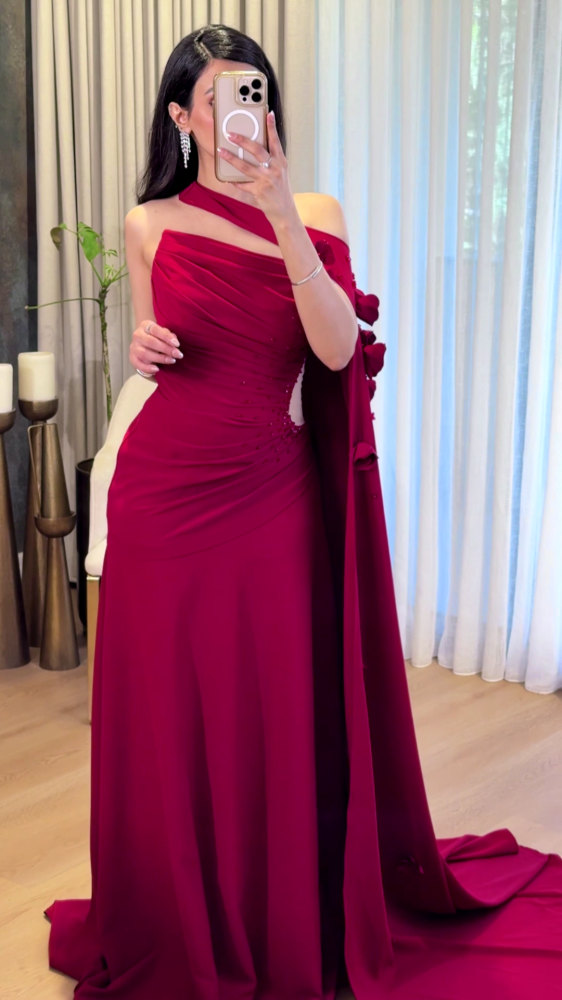 Red evening dress with a shoulder strap