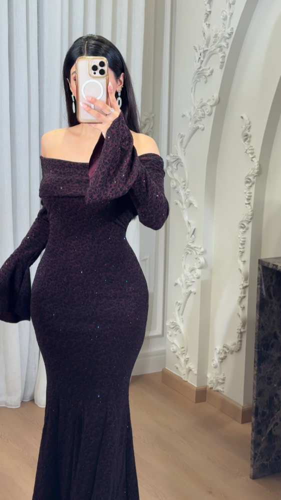 Luxurious feminine dress with intricate patterns in black