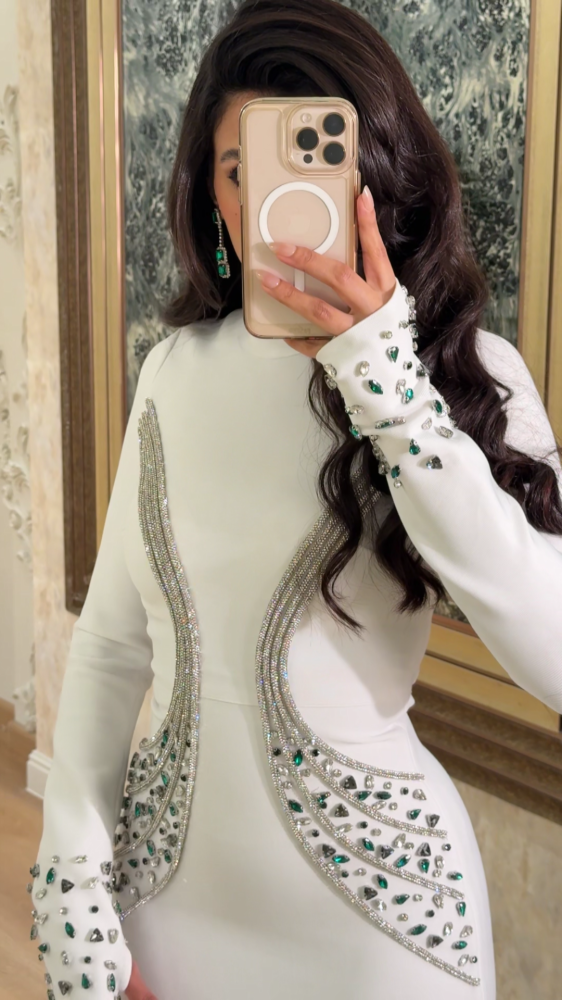 Royal white evening dress studded with crystals
