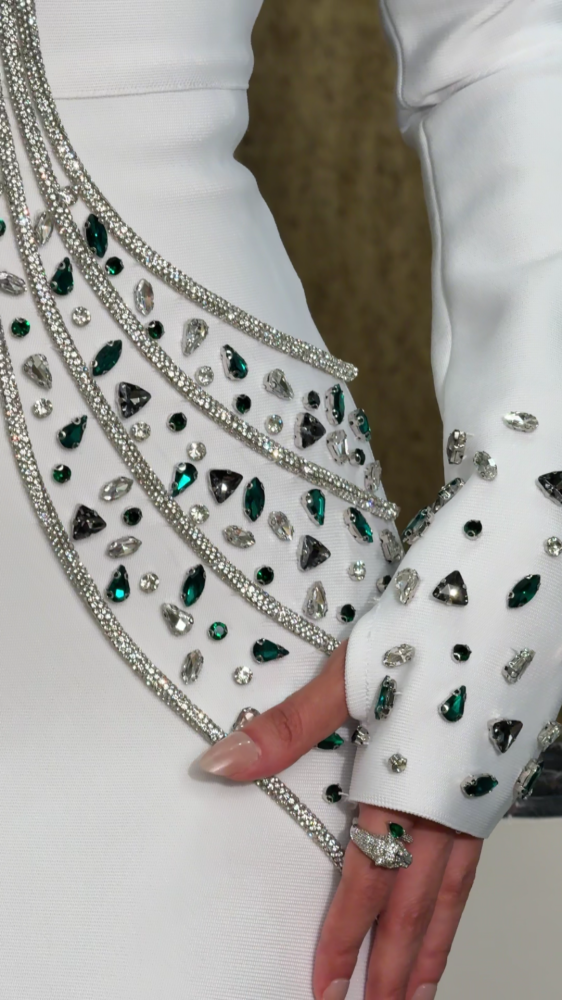 Royal white evening dress studded with crystals