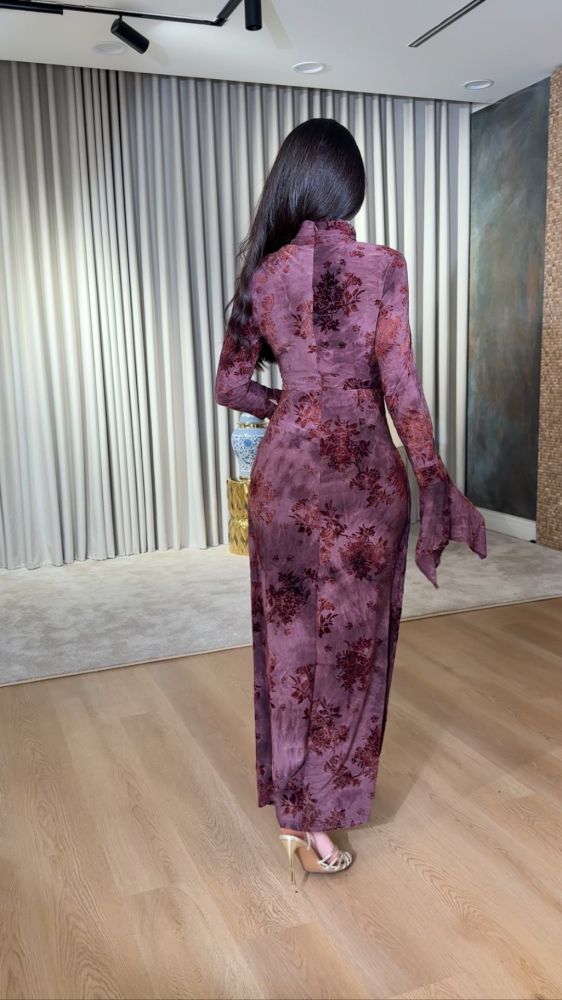 Dark purple dress with a luxurious floral pattern
