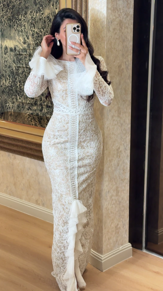 Luxurious white lace dress with elegant design