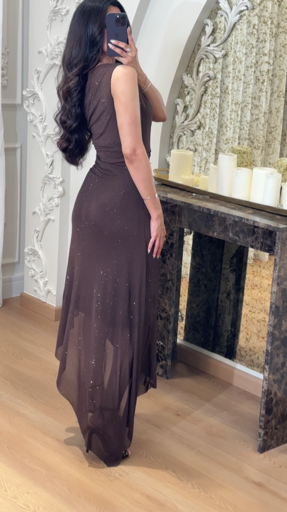A luxurious mocha evening dress with a sophisticated feminine design