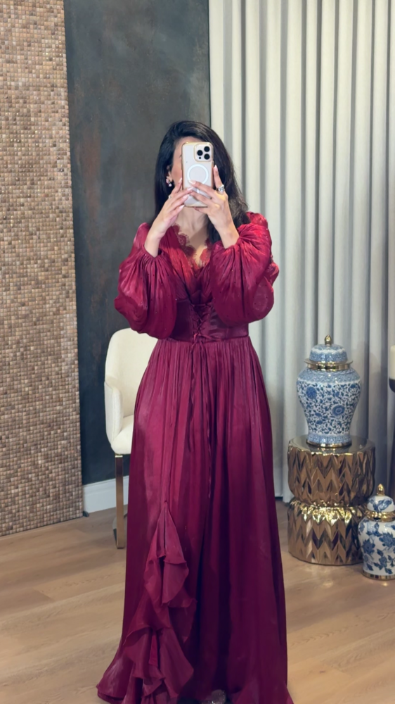 Luxurious burgundy red dress with a corset cut