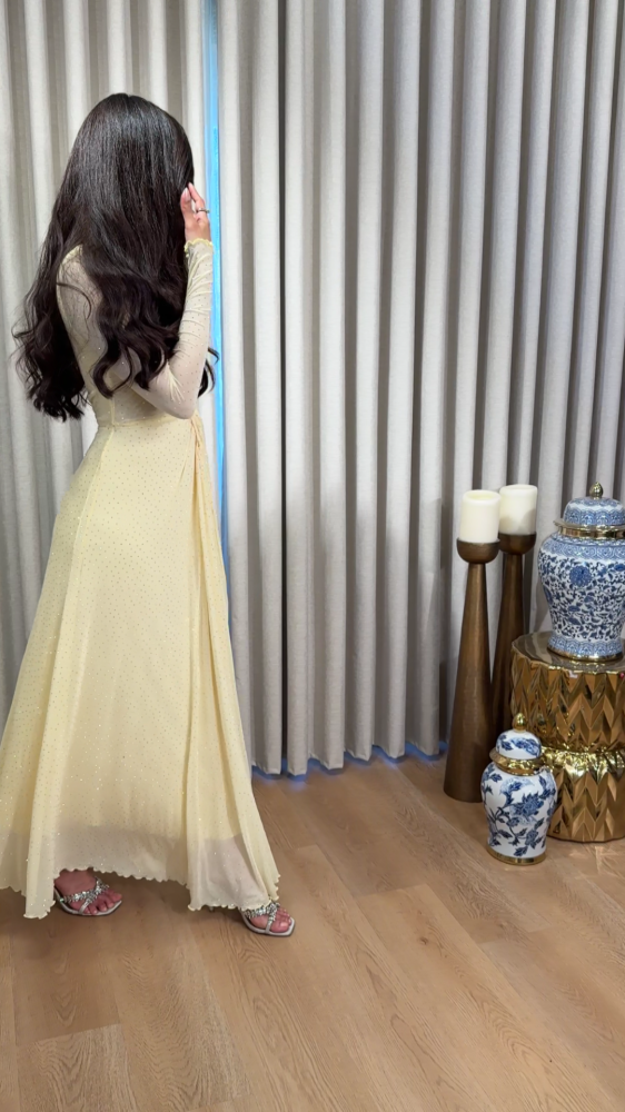 Soft yellow tulle dress with scattered crystals