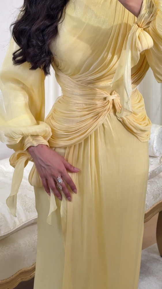 Soft pastel yellow dress with shine